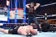 Moxley smashes Lesnar with a steel chair